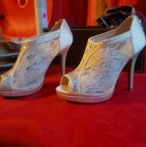 Lace and rhinestone open toe heels